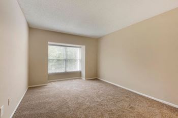 Carpeted Bedroom with Window
